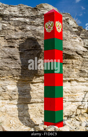 Border post on the frontier with the emblem of the Russia Stock Photo