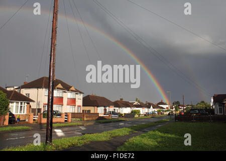 Epsom, Surrey, UK. 1st September 2015. After a very heavy rain shower, a magnificent double rainbow appeared over Epsom, Surrey. Credit:  Julia Gavin UK/Alamy Live News Stock Photo