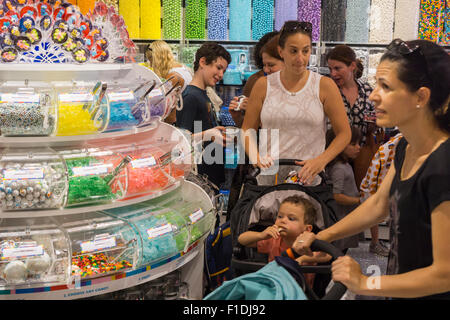 New York, USA. 1st September, 2015. Customers shop at the grand opening of Dylan's Candy Bar in Union Square in New York on Tuesday, September 1, 2015. The new store, a downtown outpost of the Upper East Side flagship, is 3300 square feet in a high foot traffic location. Despite the candy, the average age of a Candy Bar customer is 30 years old.  (© Richard B. Levine) Credit:  Richard Levine/Alamy Live News Stock Photo