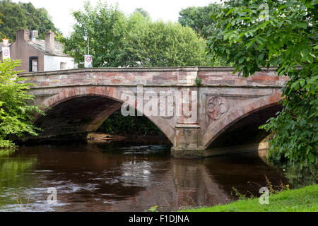 Ancient stone bridge over the river Eden in the centre of Appleby.  This is also the site of the annual horsefair event. Stock Photo