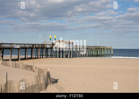 Ocean City, MD – May 13, 2015: The OC Fishing Pier stretches from the Boardwalk to the ocean in Ocean City, Maryland. Stock Photo