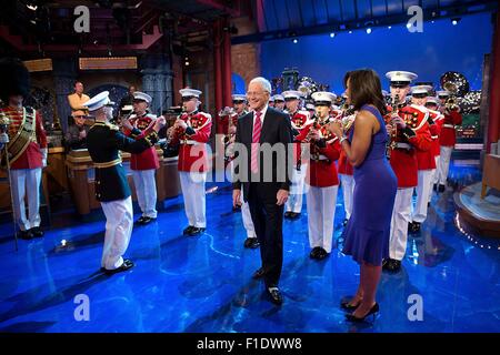 U.S. First Lady Michelle Obama surprises host David Letterman with a performance by the United States Marine Band on The Late Show with David Letterman April 30, 2015 in New York, N.Y. Stock Photo