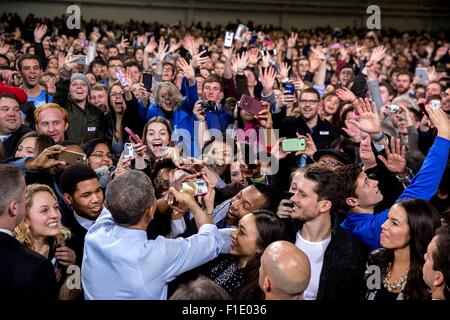 U.S. President Barack Obama greets audience members after he delivers remarks at the Anschutz Sports Pavilion at the University of Kansas January 22, 2015 in Lawrence, Kansas. Stock Photo