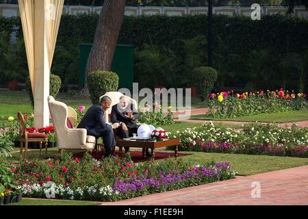 U.S. President Barack Obama and Indian Prime Minister Narendra Modi have tea in the garden gazebo at Hyderabad House January 25, 2015 in New Delhi, India. Stock Photo