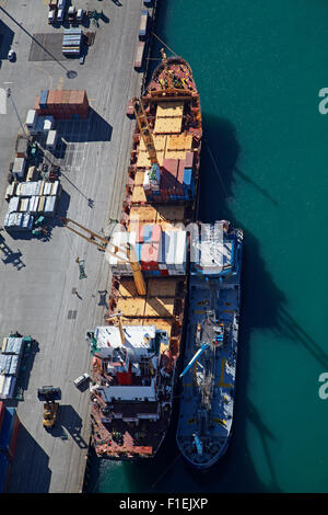 Ships at Ports of Auckland, Auckland, North Island, New Zealand - aerial Stock Photo