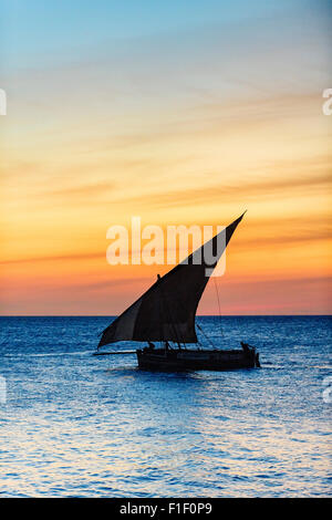 Arab Dhow Zanzibar Tanzania at sunset Stock Photo