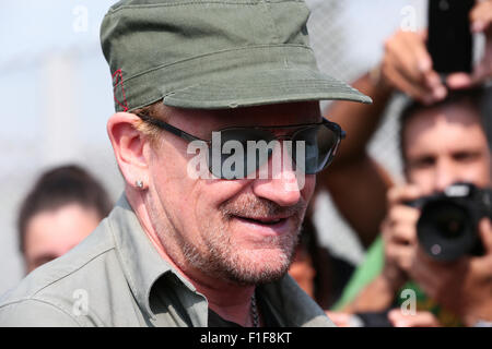Turin, Italy. 01st Sep, 2015. Bono Vox, the frontman of the Irish rock band U2 arrives at the Olympic Stadium where hundreds of their fans wait for press conference and autograph signing. Credit:  Elena Aquila/Pacific Press/Alamy Live News Stock Photo