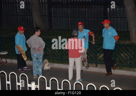 Beijing, Beijing, CHN, China. 28th Aug, 2015. Beijing, CHINA - August 31 2015: (EDITORIAL USE ONLY. CHINA OUT) With parade in memory of victory of 70th anniversary of the War of Resistance Against Japan coming, anti-terrorism in Beijing goes to the highest level. 850000 volunteers with red armband go to streets to monitor if there's any unsafe factor. © SIPA Asia/ZUMA Wire/Alamy Live News Stock Photo