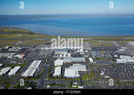 Auckland Airport Domestic Terminal and Manukau Harbour, North Island, New Zealand - aerial Stock Photo