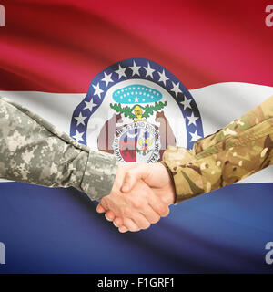 Soldiers handshake and US state flag - Missouri Stock Photo