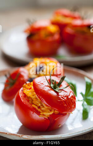 Tomatoes stuffed with rice an pine nuts Stock Photo