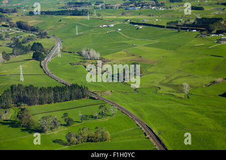 North Island Main Trunk Railway Line near Paerata, South Auckland, North Island, New Zealand - aerial Stock Photo