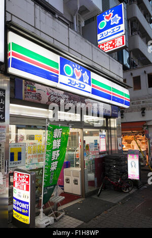 Three F signboards on display at the entrance of one of its convenience store on September 2, 2015, Tokyo, Japan. Store operators Lawson Inc. and Three F Co. announced on Monday that they had started to negotiations for a business tie-up that would allow them to work together in product development and procurement. The smaller Three F brand is expected to be maintained and the companies will continue to manage their own distribution. © Rodrigo Reyes Marin/AFLO/Alamy Live News Stock Photo