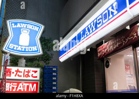 Lawson signboards on display at the entrance of one of its convenience store on September 2, 2015, Tokyo, Japan. Store operators Lawson Inc. and Three F Co. announced on Monday that they had started to negotiations for a business tie-up that would allow them to work together in product development and procurement. The smaller Three F brand is expected to be maintained and the companies will continue to manage their own distribution. © Rodrigo Reyes Marin/AFLO/Alamy Live News Stock Photo