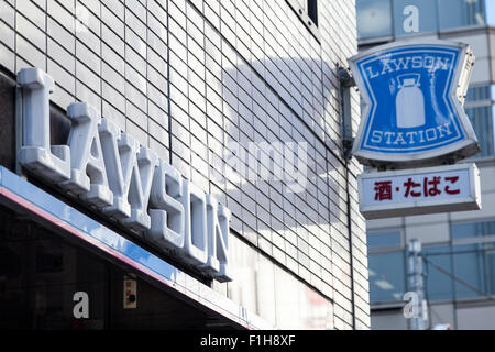 Lawson signboards on display at the entrance of one of its convenience store on September 2, 2015, Tokyo, Japan. Store operators Lawson Inc. and Three F Co. announced on Monday that they had started to negotiations for a business tie-up that would allow them to work together in product development and procurement. The smaller Three F brand is expected to be maintained and the companies will continue to manage their own distribution. © Rodrigo Reyes Marin/AFLO/Alamy Live News Stock Photo