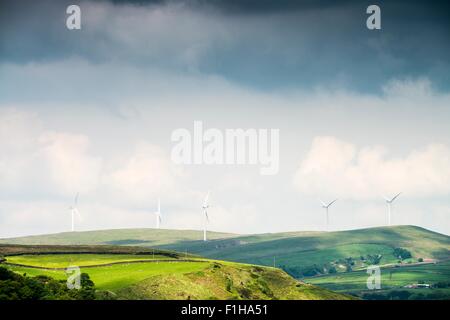 View of wind turbines on moorland hills, UK Stock Photo