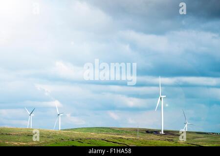 View of wind turbines on moorland, UK Stock Photo