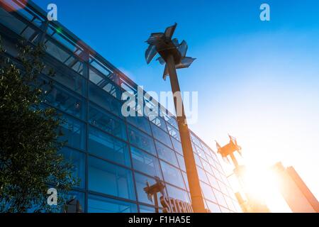 Miniature windmills next to shopping centre, Manchester, UK Stock Photo