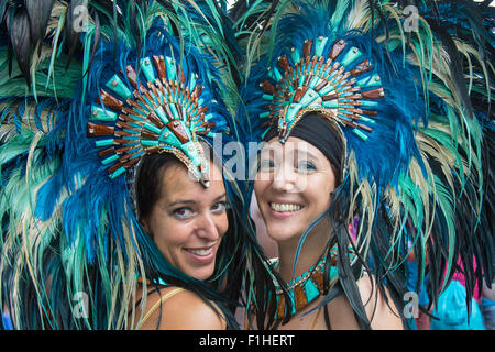 London, August 31st 2015. Revellers ignore the inclement weather to enjoy day two of the Notting Hill Carnival. Credit:  Paul Davey/Alamy Live News Stock Photo