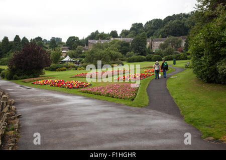 Late summer flowers on display in Haworth Central Park West Yorkshire a tourist attraction and area associated with the Brontes Stock Photo