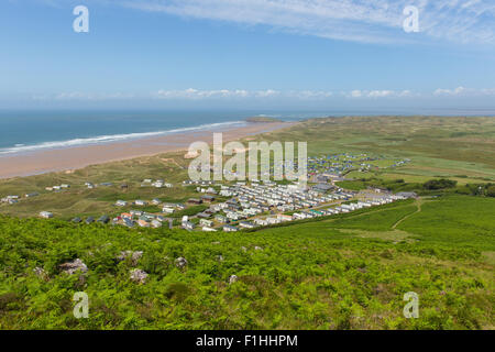 View from Rhossili Down to Hillend The Gower coast Wales UK in summer with caravans and camping on the campsite Stock Photo