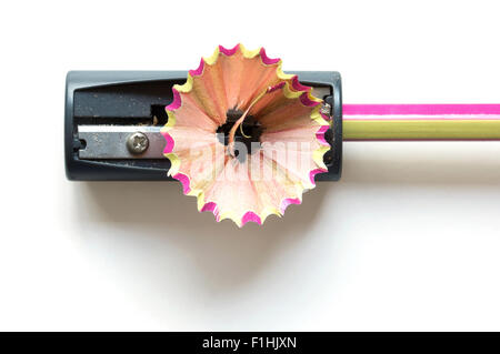 pencil with sharpening shavings on white background Stock Photo