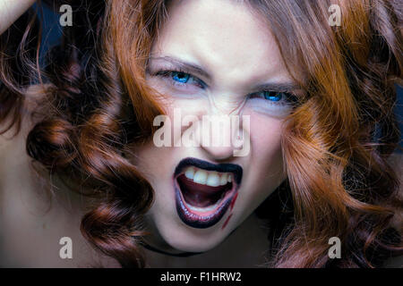 evil vampire girl portrait Stock Photo