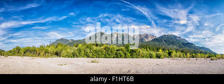 Banks of the River Isar in Bavaria, Germany with a view to the Karwendel mountains Stock Photo