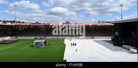 Berlin, Germany. 2nd Sep, 2015. Workers cover the grass field of 1. FC Union's soccer stadium in Berlin, Germany, 2 September 2015. The US rockband Linkin Park will give a concert in the stadium 3 September 2015. PHOTO: SOEREN STACHE/dpa/Alamy Live News Stock Photo