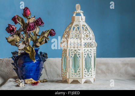 Lamps and vases with white vintage images. Stock Photo
