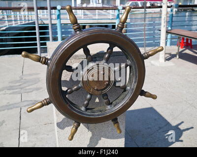 old wooden ships helm wheel Stock Photo