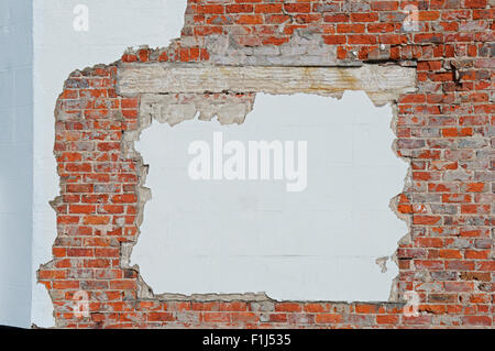 Plaster on brick wall, England UK Stock Photo