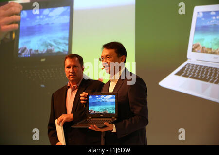 Berlin, Germany, 2st September, 2015: CEO of Acer, Jason Chen presents the company' s recent chrome notebook during media conference at IFA consumer electronics unlimited fair 2015. Stock Photo