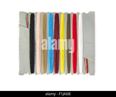 Closeup view of sewing threads multicolored on a white background Stock Photo