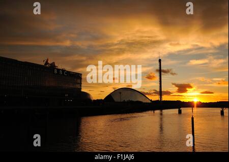 Glasgow, Scotland, UK. 02nd Sep, 2015. Sunset over the River Clyde, with the BBC and the Science Centre silhouetted against the glowing sky Credit:  Tony Clerkson/Alamy Live News Stock Photo