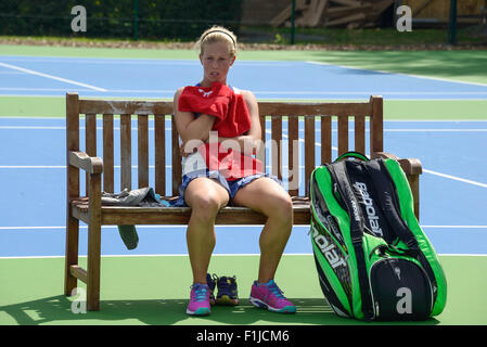 Teenager player resting at tennis match at The Riverside Health & Rackets Club Chiswick, Greater London, England, United Kingdom Stock Photo