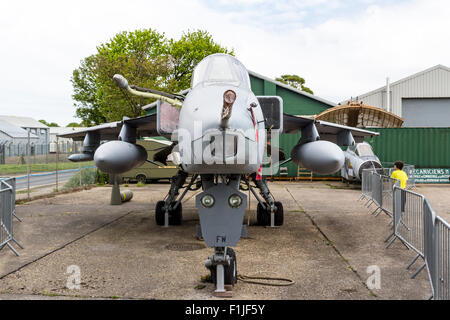 Manston Airport Museum. British GR3 Jaguar close support and nuclear strike fighter on former airport apron, now fenced off as outdoor display. Stock Photo