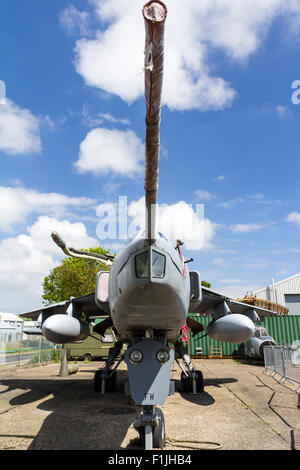 Manston Airport Museum. British GR3 Jaguar close support and nuclear strike fighter on former airport apron, now fenced off as outdoor display. Stock Photo