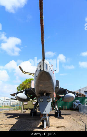 Manston Airport Museum. British GR3 Jaguar close support and nuclear strike fighter on former airport apron, now fenced off as outdoor display. Stock Photo