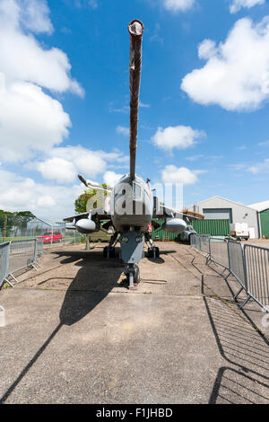 Manston Airport Museum. British GR3 Jaguar close support and nuclear strike fighter on former airport apron, now fenced off as outdoor display. Stock Photo