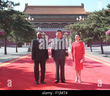 Beijing, China. 3rd Sep, 2015. Chinese President Xi Jinping (C) and his wife Peng Liyuan (R) pose for a group photo with President Omar Hassan Ahmad al-Bashir of Sudan, ahead of the commemoration activities to mark the 70th anniversary of the Chinese People's War of Resistance Against Japanese Aggression and the World Anti-Fascist War, in Beijing, capital of China, Sept. 3, 2015. © Ding Lin/Xinhua/Alamy Live News Stock Photo