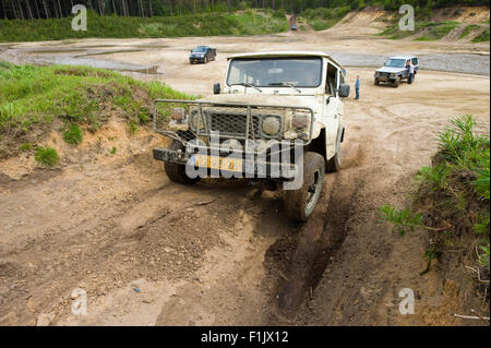 A jeep is driving on a special off the road terrain for land cruisers and vehicles in Germany Stock Photo