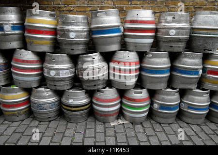 Empty beer barrels kegs outside a pub in Bermondsey South London UK   KATHY DEWITT Stock Photo