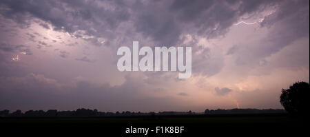Thunder and lightning at the end of a hot and moistly summer day in the ...