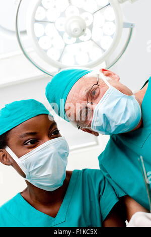 Surgeons looking down Stock Photo