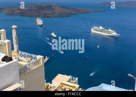 Cruise ships near Santorini, one of the Cyclades islands in Aegean Sea, Greece. Stock Photo