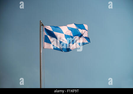 Bavarian flag in front of a blue sky Stock Photo