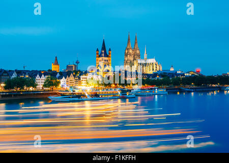 Great St. Martin Church And Dom In Cologne At Evening With Reflection In River Rhine. Stock Photo