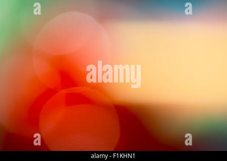bokeh abstract background in Christmas colours with lighter space for text Stock Photo
