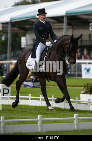 Stamford, UK. 3rd September, 2015. Andrew Hoy (AUS) and Rutherglen [#27] during the dressage phase on the first day of competition. The Land Rover Burghley Horse Trials 2015 Credit:  Stephen Bartholomew/Alamy Live News Stock Photo